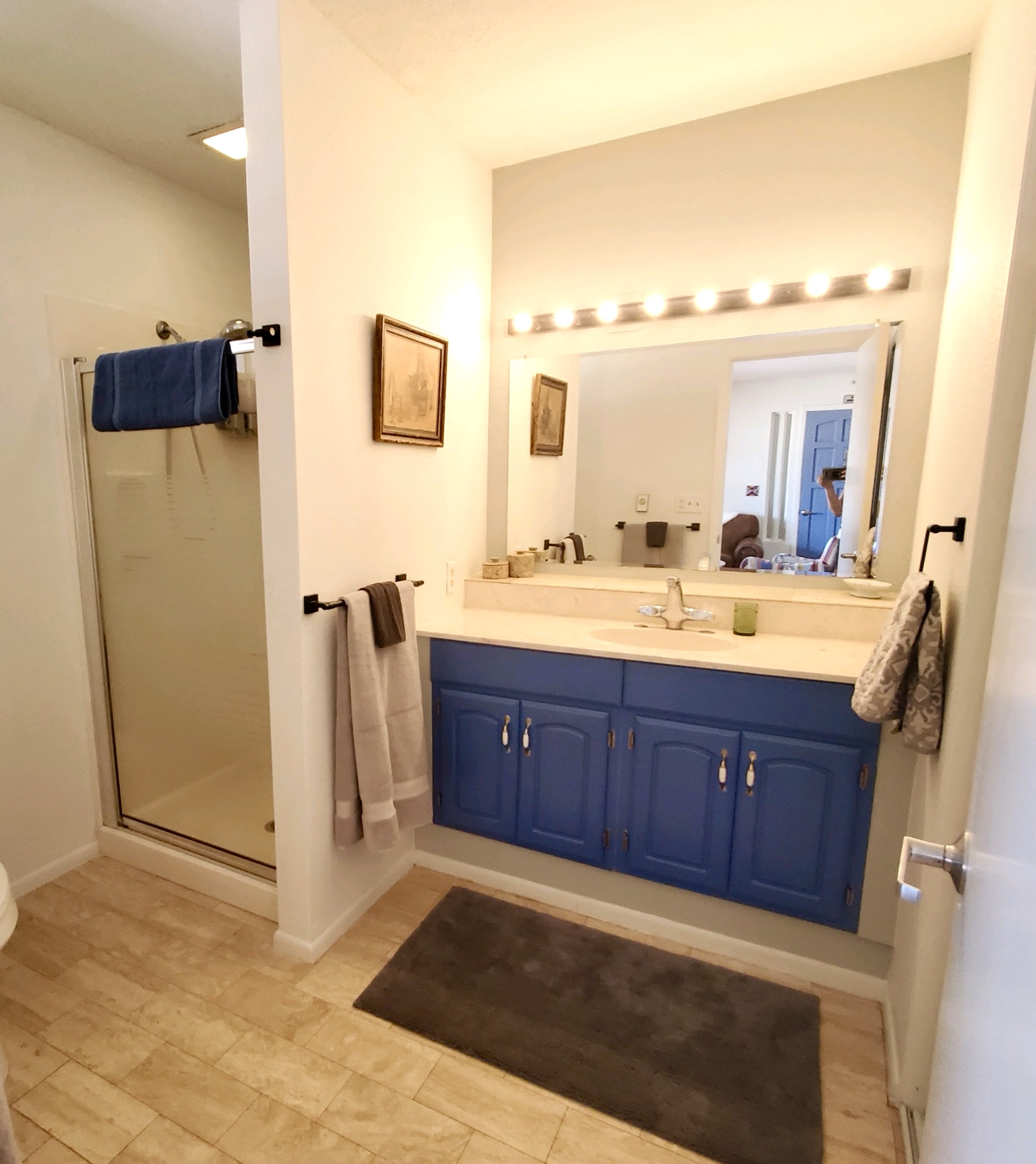 Full Bath with large vanity and shower.  Large closet in bathroom.